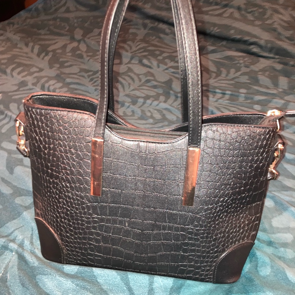 Black and gold handbag